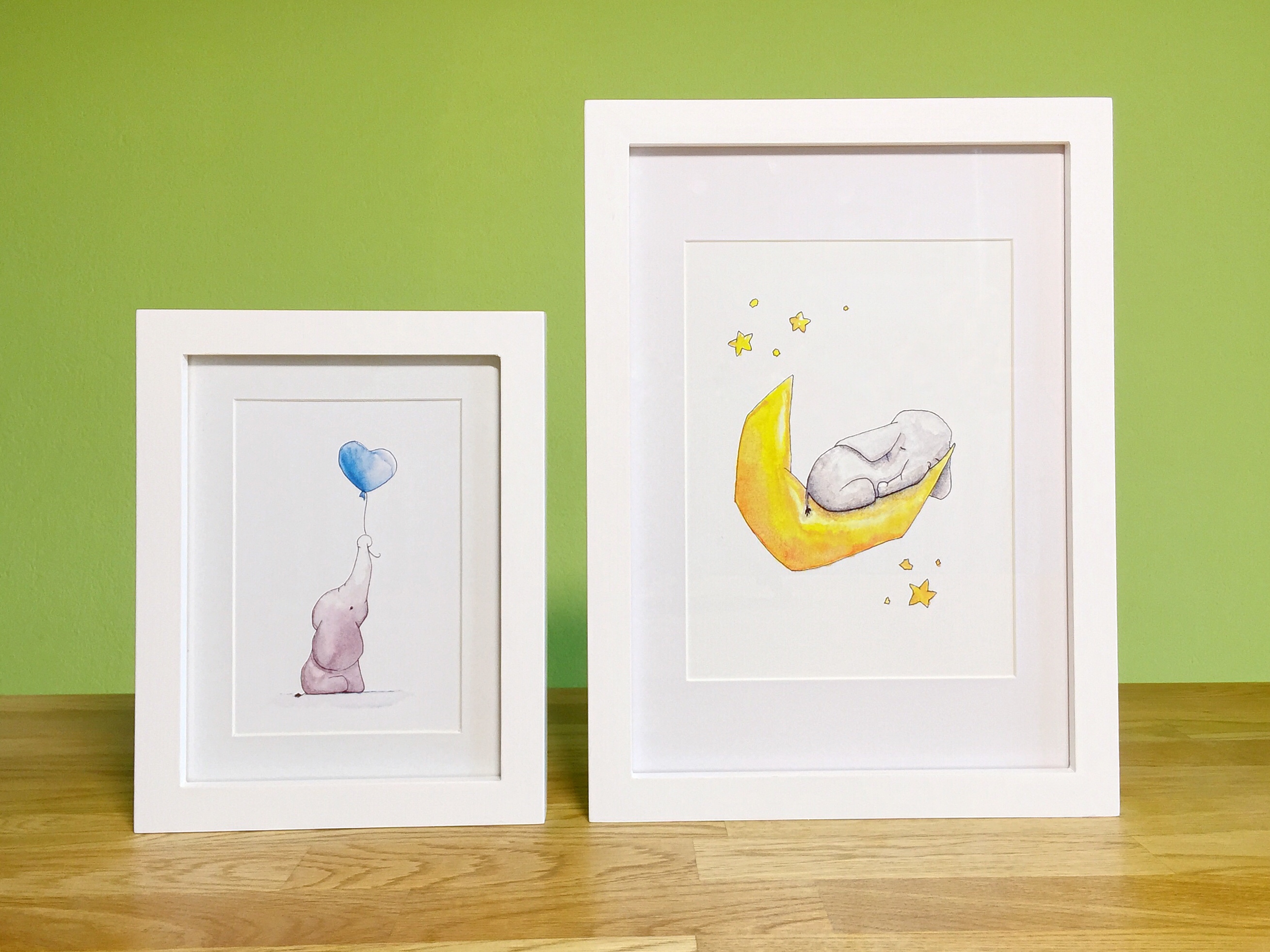 Elefanten in unterschiedlichen Größen gedruckt und gerahmt